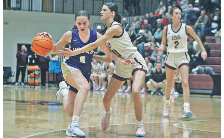 Lumpkin County’s Emmie Kate Reece gets past a Dawson County defender in the two team’s recent matchup.