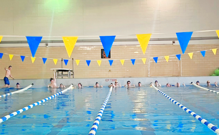 The Lumpkin swim team prepares to make some laps.