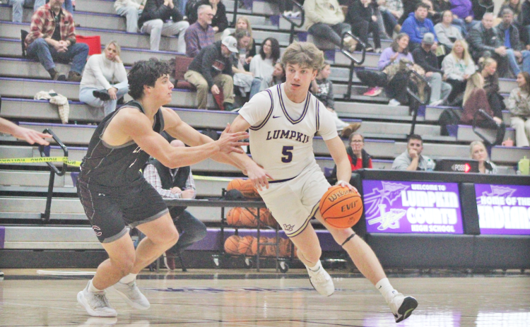 Lumpkin County’s TJ Gaddis drives down the court during last week’s game against Chestatee.