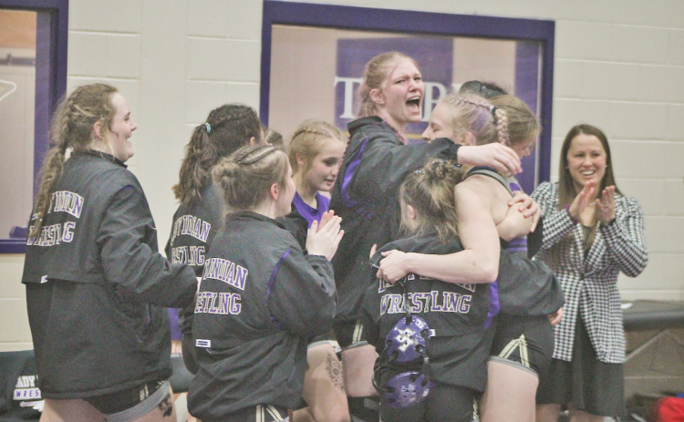 Maxine Sullens and the Lumpkin County High School team celebrate their State Championship victory.