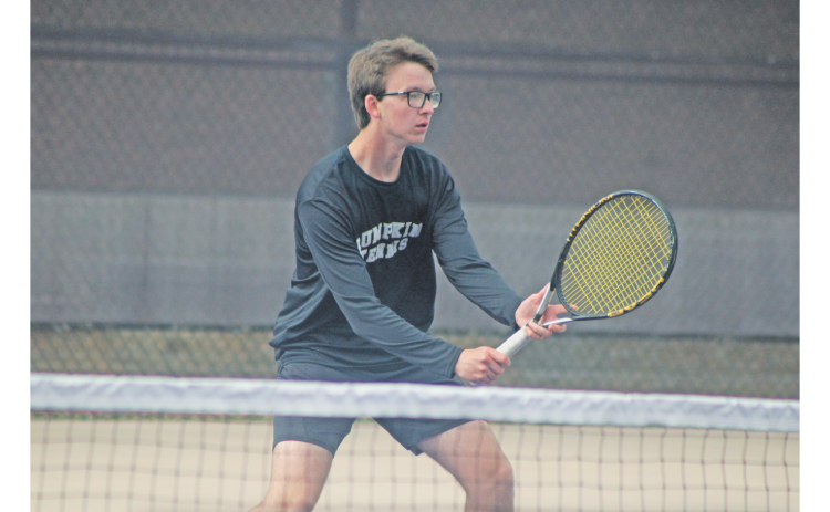Barrett Wilkinson awaits a serve from his Johnson opponent.
