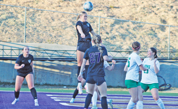 Kaitlyn Johnson goes up for a header during this week’s game against Franklin.