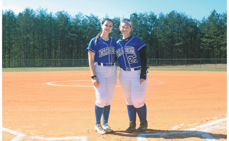 Heidy Bentancourt (left) and Gabrielle Niemczyk were honored as the UNG club softball teams’ two seniors.