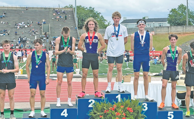 Brothers Wyatt Windham (second) and Witt Windham (fifth) stand on the State Championship podium together.