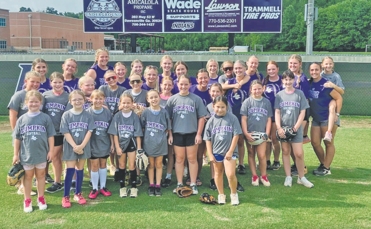 Youth soccer campers and varsity players gather at last week’s camp.