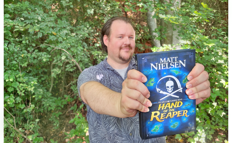 After years of work, local author Matt Nielsen has completed his epic swashbuckling novel Hand of the Reaper: Islands of the Cursed Seas.