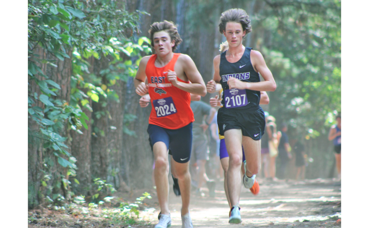 Lumpkin runner Witt Windham (right) won his third straight race this season at UNG’s Oakwood course.