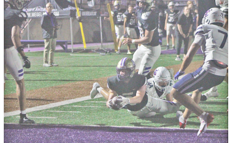 Lumpkin County’s Nolan Matthews dives into the end zone for an Indians touchdown versus Dunwoody.