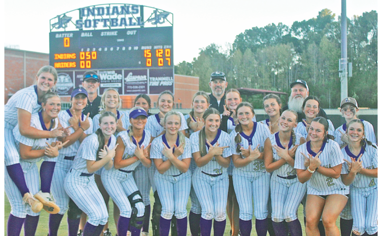 The Lady Indians celebrate their blowout win over Riverdale, which allowed the team to advance in the State Playoffs.