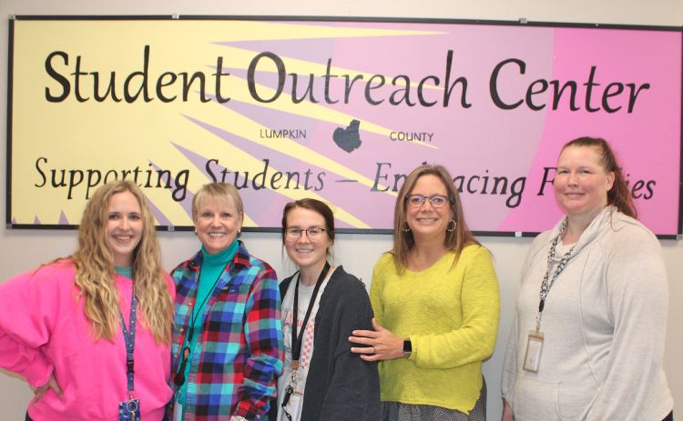 Pictured at the local Student Outreach Center are (from left) Coordinator Makenzy Horne, LBES Family Advocate Patricia Jarvis, CES & LCMS Family Advocate Taylor Anderson, Lumpkin County Family Connections Director Brigette Barker and Backpack Buddies Attendant Jennifer Trotter.
