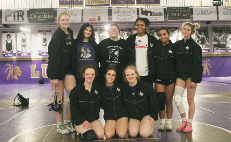The Lady Indians wrestling team’s seniors celebrated their night with a win over Carrollton.