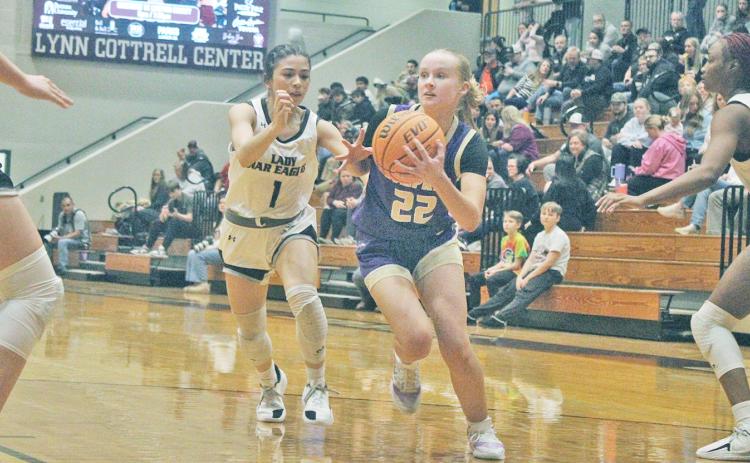 Lumpkin’s Anna Davis goes in for a layup against Chestatee.