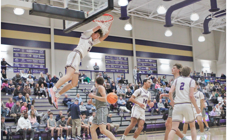 Lumpkin’s Martin Hulsey throws down a dunk over White County.