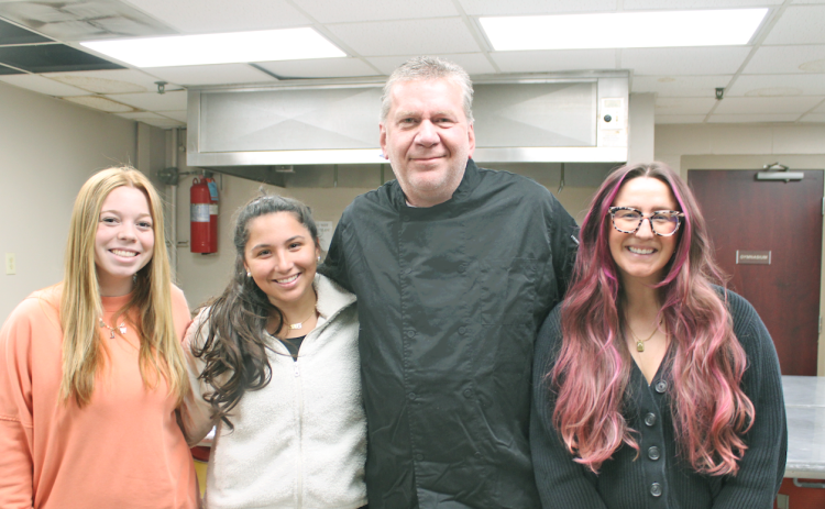 Pictured inside the Parks & Rec kitchen are (from left) Front Desk Associates Cali Timms and Cody Jackson, Chef Steve Hewins and Administrative Coordinator Scarlet Shumate.