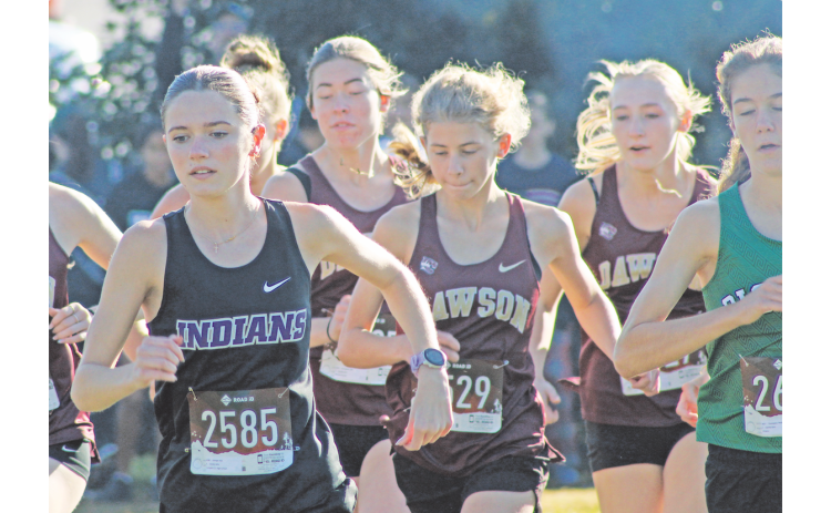 Lumpkin County’s Keli George (left) leads a pack of runners.