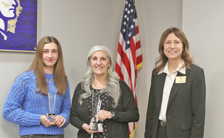 Lumpkin County High School’s 2025-2026 Star Student, senior Haley Hayes (left), joins her Star Teacher choice Lisa Lopresti (center) and Superintendent Sharon Head during a ceremony at the January 12 Board of Education meeting.