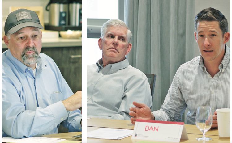 Mayor Sam Norton (pictured from left), City Council members Ross Shirley and Dan Brown discuss topics at last week’s off-site retreat, which was held in Rome. One topic was the proposal of a convention center that could attract new business and tourists during off-peak days and seasons.