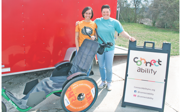 ConnectAbility board member Sarah Snyder (left) and Director of Innovation & Operations Jessica “Bird” Brown are ready for a brand new season of Race for a Reason. The program provides custom equipment and group transportation as needed, and is looking for volunteers and participants of all ability levels.