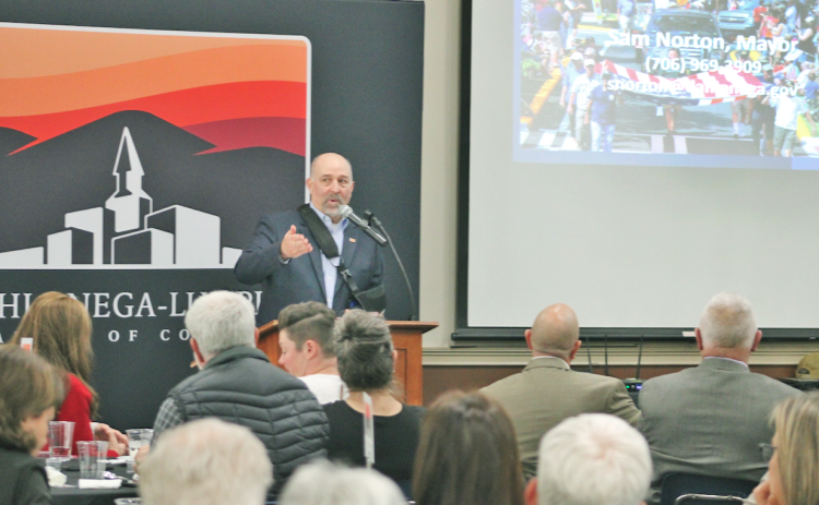 Dahlonega Mayor Sam Norton addressed a packed crowd during the annual State of the City and County on March 19. Norton cited housing and parking as the top challenges facing the City, while also warning of a shrinking tax base.  Interim Chairman of the Lumpkin County Board of Commissioners Jeff Moran also spoke, giving updates on a number of ongoing road improvement projects.
