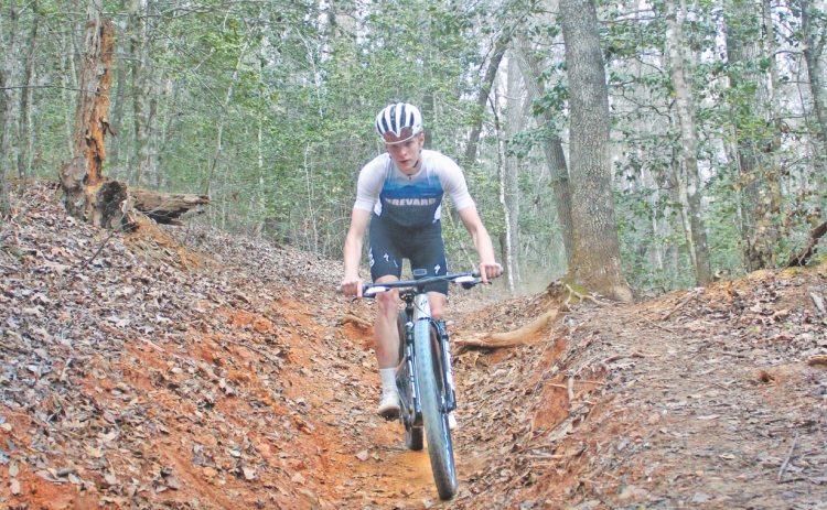 Lumpkin County cyclist Asher Boegner descends a section of trail during a recent outing.