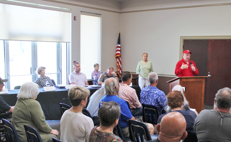 District 9 state Senate candidate Wayne Rowan addresses a crowd of concerned citizens during a Sunday afternoon community forum held at Lumpkin County Parks & Rec. The main topic of discussion was Iron Mountain ATV Park.