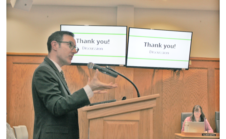 TSW Community Planner Caleb Racicot updates the Planning Commission on a forthcoming revision of Dahlonega’s development ordinances as City Manager Allison Martin looks on.