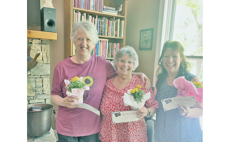Local TOPS members (from left) Kaye Campagnoli, Donna Rice and Mary Holiday celebrate during an annual chapter award banquet at Donna’s home in Dahlonega.