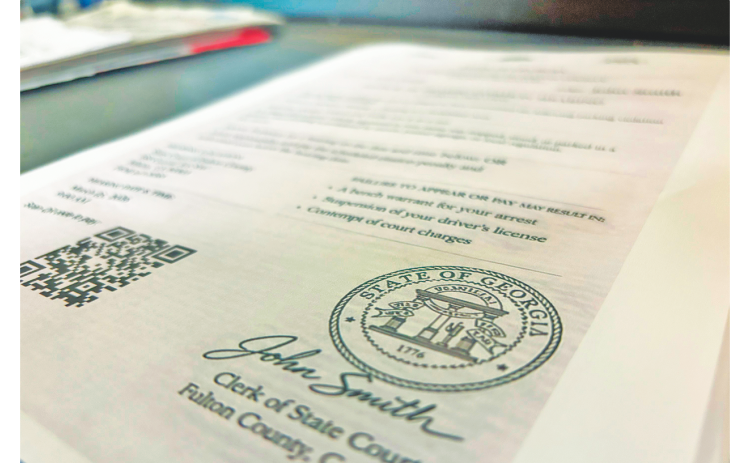 A fraudulent scam text, complete with an official-looking state seal, has been making the rounds on local cell phones lately.