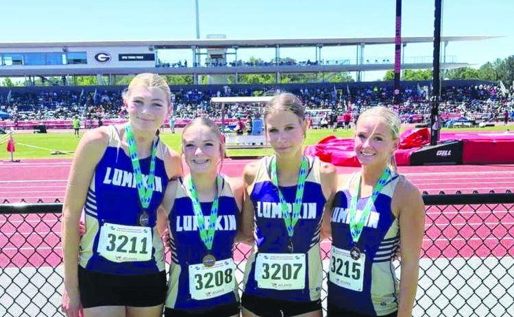 Lumpkin County runners Reagan Long, Maddox Henderson, Kellyn Coffer and Josie Webb broke their previously set school records in the 4x200 event at the State Championships.