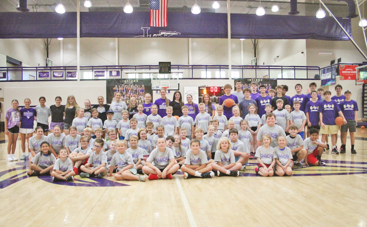 The Lumpkin County varsity athletes of today and future stars of tomorrow gather together for a photo during last week’s basketball camp.