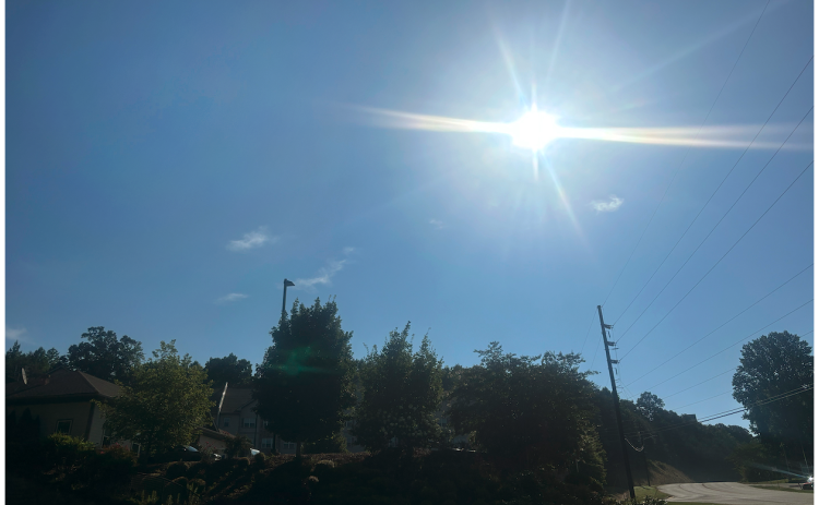 Scorching summer heat appears to have led to the death of a Gainesville man who was working in Dahlonega last week.