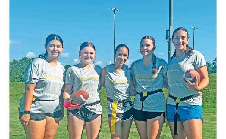 Lumpkin football athletes Gabriela Frausto, Haven Lingerfelt, Mary Meadows, Annalee Gilbert and Kylie Schubert gather for a quick photo during last week’s practice.