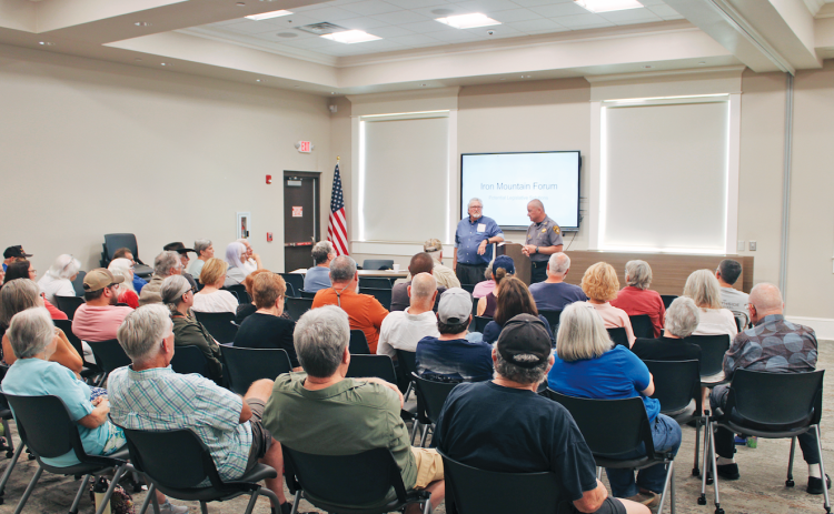 Sheriff Stacy Jarrard and District 9 State House candidate Roger Smith address the public during a special forum on Iron Mountain Park last Thursday.