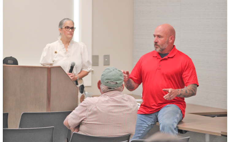 Matthew Cook said he didn’t disagree with the Sheriff’s remarks about the efficacy of the Flock camera system. “It’s a great tool, and he told you about the policies for how it’s supposed to be used. The problem is, ‘supposed to’ doesn’t always work,” Cook said, as townhall host Anita Anderson Spangler looked on.
