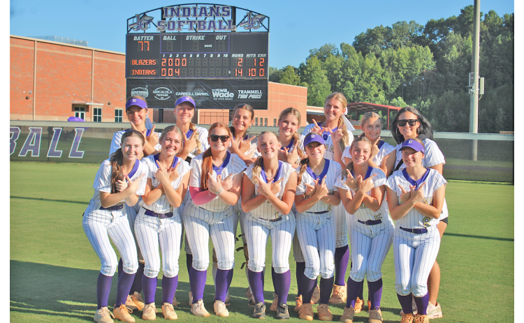 The Lady Indians celebrate their win over the Barrow Arts and Science Academy.