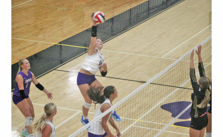 Lumpkin County’s Hadley Glenn goes up for a kill against East Hall.