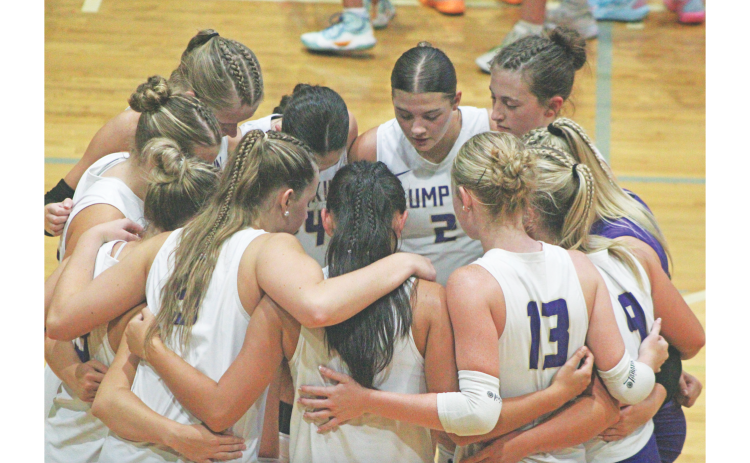 The Lady Indians take a moment before clashing with rival Dawson County last week.