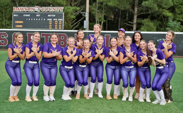 The Lady Indians celebrate their win over The Tigers on Dawson County’s field.