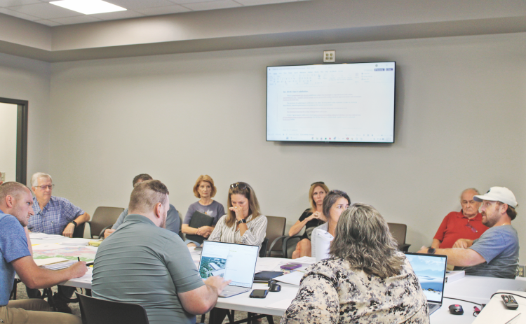 Lumpkin County Land Use & Development Regulations Review Committee member Trevor Eudy (far right) expressed concerns that The Nugget would exaggerate proposed changes to Class V subdivisions.