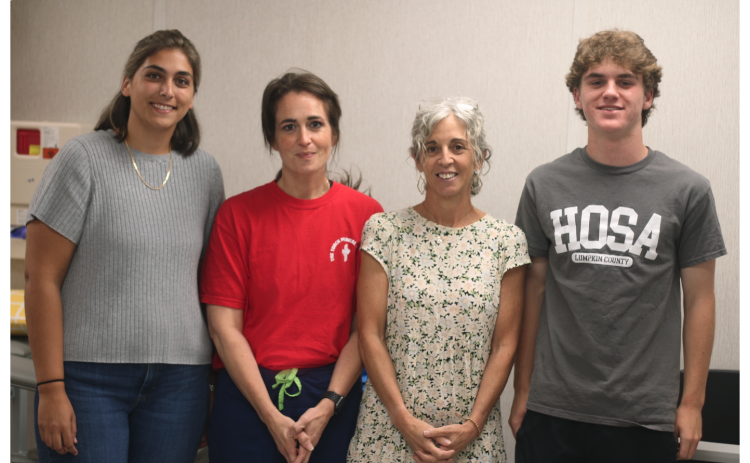 Event organizers (pictured, from left) Alana Furney, Linda Sanchez, Paula Payne and Ridge Cole look ahead to CHP’s free Community Health Day on Saturday, September 12.