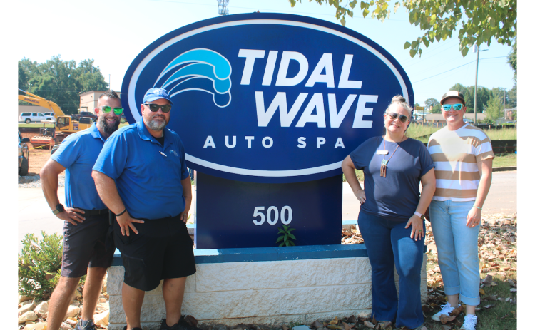 Pictured from left: Tidal Wave Auto Spa Manager Mat Conard, Assistant Manager Tim O’Brien ConnectAbility Director of Community Connections Kim Bell and Director of Innovation & Operations Bird Brown are ready to clean up for charity on September 18.