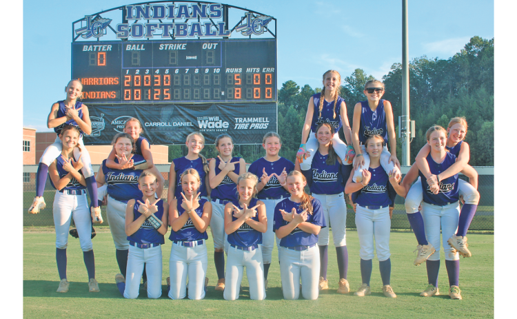 The Lady Indians celebrate their big walk-off win over White County on Eighth Grade Night.