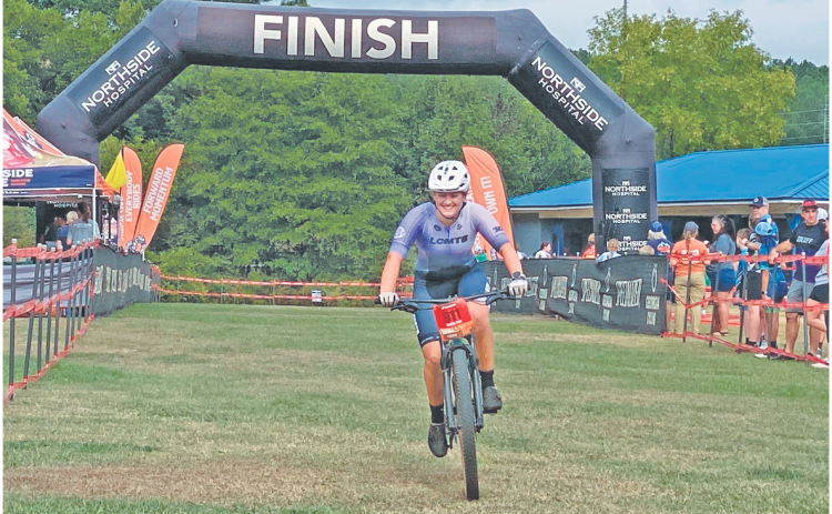 Amelia Turk crosses the finish line in 6th place—her season best—and a crucial performance to earn the team a 3rd place finish out of 23 Division I teams. (Submitted photo)
