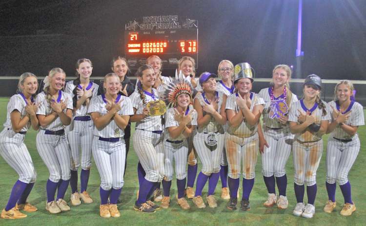 The Lumpkin softball team celebrates their win over Murray County in the first round of the state playoffs.