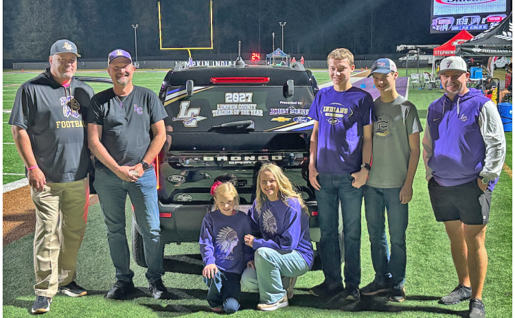 Pictured, from left, are Brian Matthews, Riley Ray, Kiley Ray, Julie Ray, Isaiah Ray, Ethan Ray and Shawn Boyd during halftime of last week’s home football game.