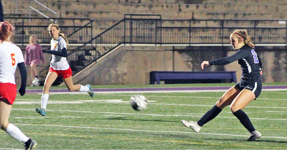 Midfielder Ashley Read blast a shot from just outside the box for one of her two goals in Lumpkin’s scrimmage win over the Lady Gladiators on Friday, Jan. 31.