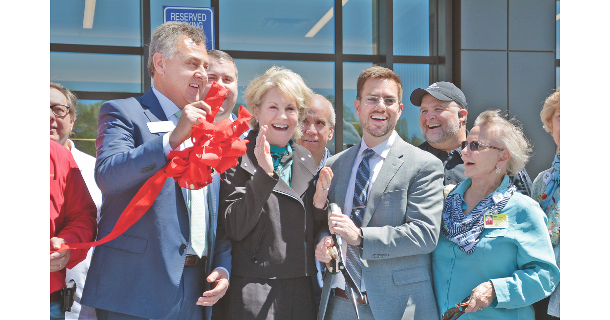 A jubilant crowd celebrated the opening of the new Northeast Georgia Medical Center Lumpkin location on Saturday. Pictured (from left) State Senator Steve Gooch, President & CEO of Northeast Georgia Health System Carol Burrell, NGHS Vice President of Regional Hospitals Kevin Matson, and Northeast Georgia Physicians Group board member Jane Taylor were among the many representatives who gathered to mark the beginning of the new era in local healthcare. (Photo by John Bynum / The Nugget)