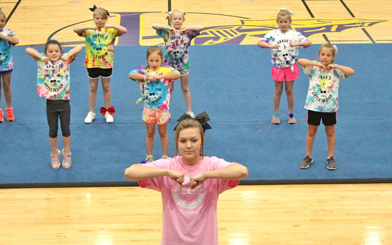 LCHS sophomore Alyssa Caldwell leads campers in a dance routine during a Friday night performance that showcased everything participants of Annah's Cheer Camp learned during the four-day camp.