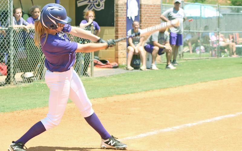 Lady Indians player Haley Voyles knocks in a Lumpkin run with a RBI single. The team will begin its 2019 season versus White County this Friday, August 2.
