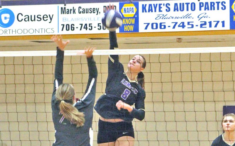 Makenzie Caldwell lets loose with a powerful spike versus the Union County Lady Panthers. Aggressive net play has been an integral part of the Lady Indians’ success this season.